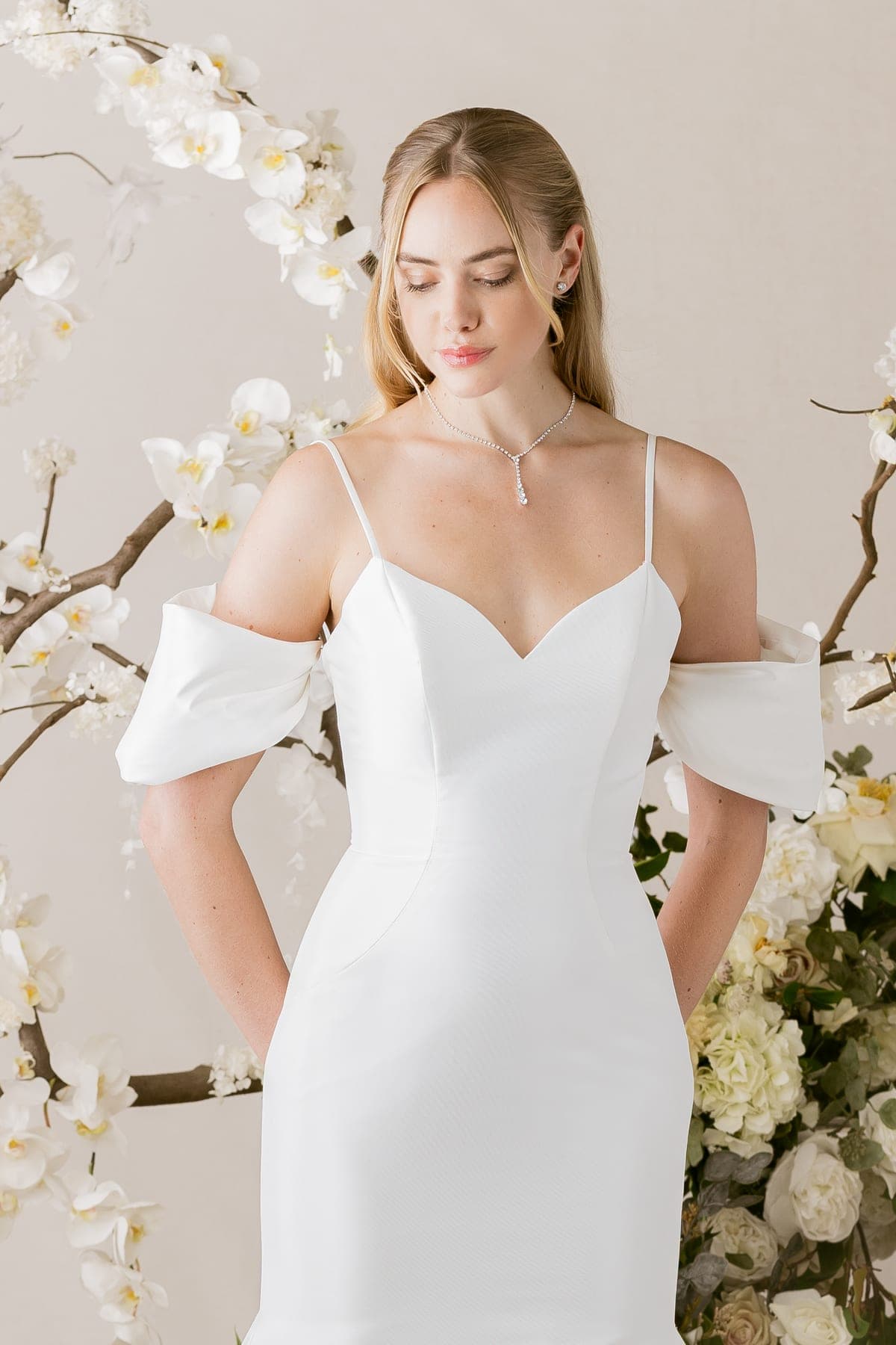 Dettaglio sartoriale di un abito da sposa